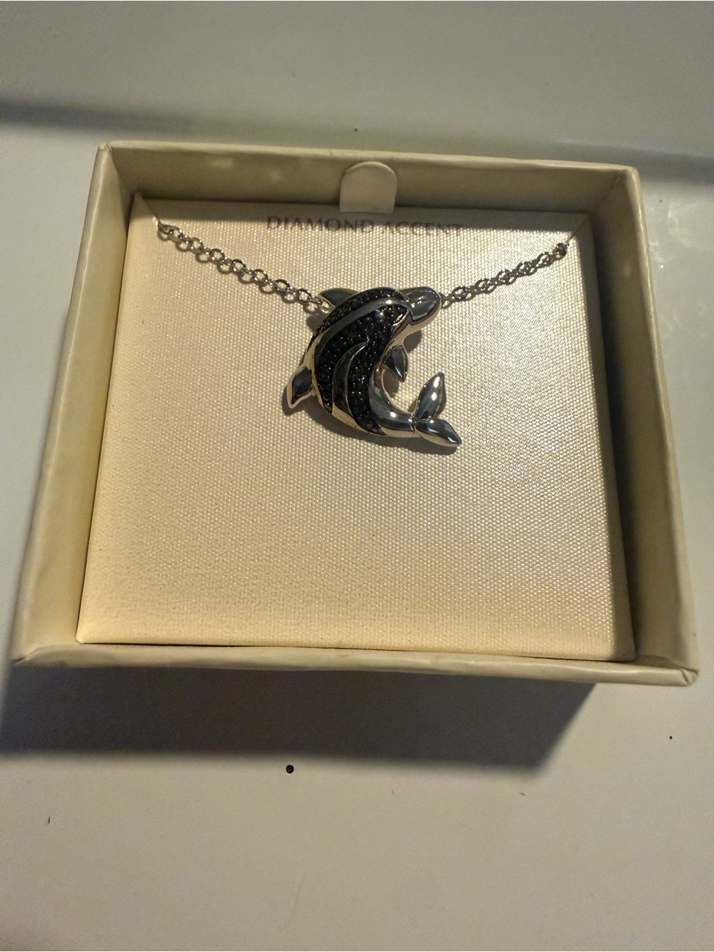 Silver Dolphin Pendant Necklace with Black Accent Diamonds  -